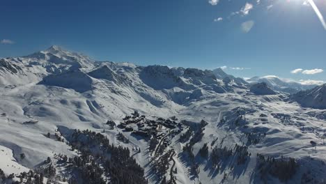 Aerial-view-of-the-ski-resort-la-plagne-snowy-landscape.-Sunny-day-in-France.